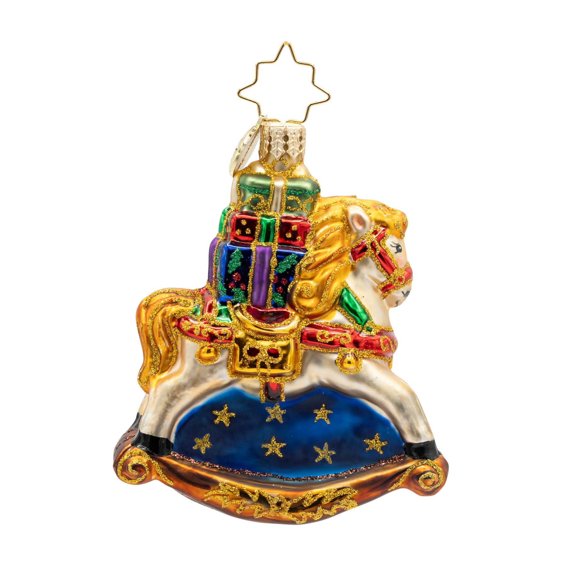 Rocking horse Christmas ornament with hand-painted gifts and a blue base with gold stars.