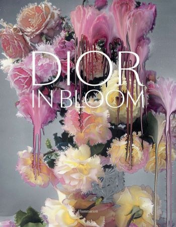 Dior In Bloom book cover with pink and yellow flowers and dripping paint effect.