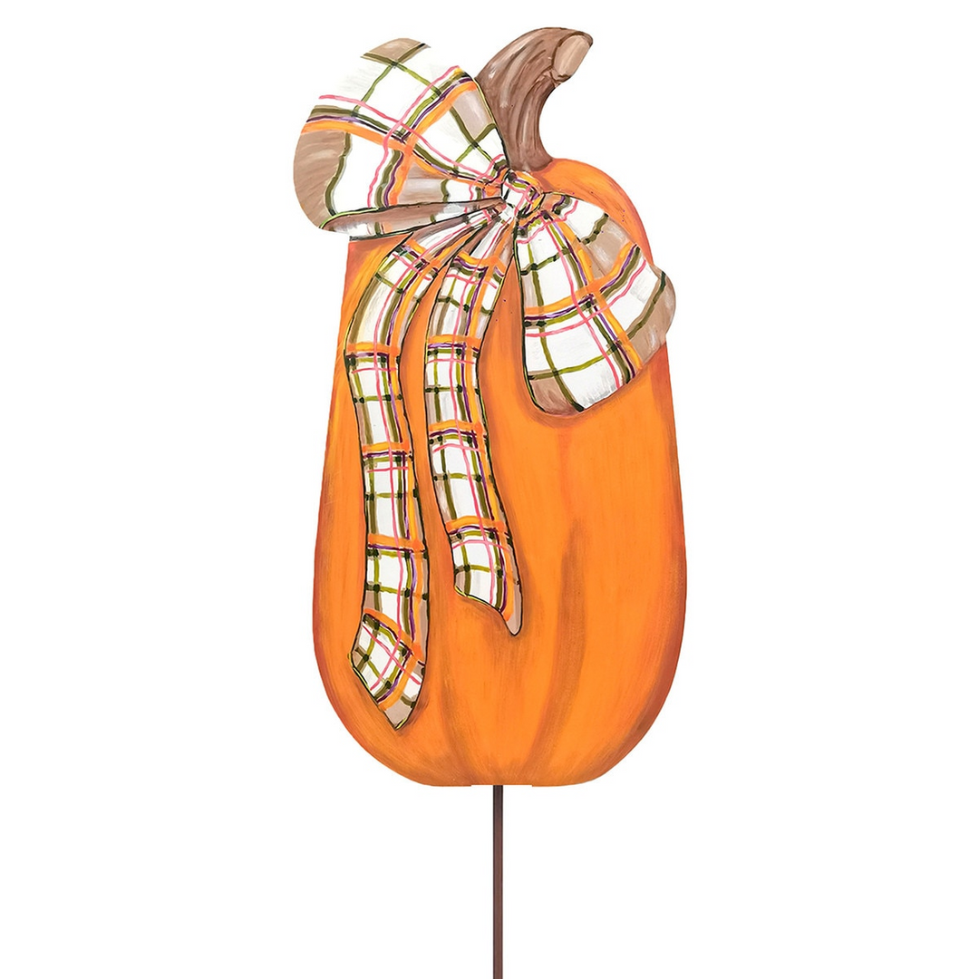 Large orange pumpkin yard stake featuring a decorative plaid bow with green and pink accents.