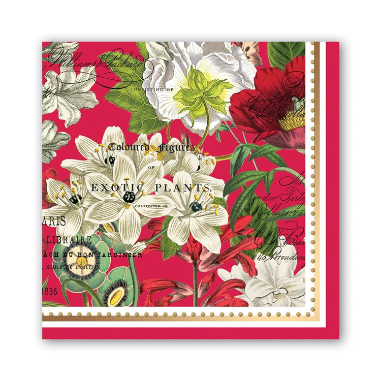 Holiday luncheon napkin with a red background and a floral pattern of white and red exotic plants.