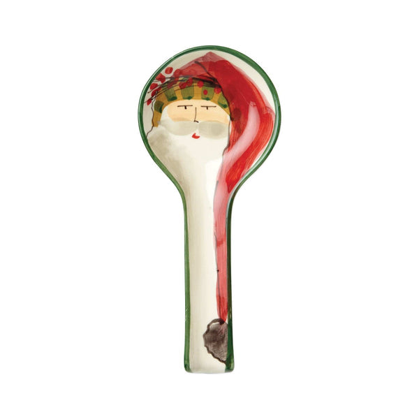 Old St. Nick ceramic spoon rest featuring a hand-painted Santa Claus with a long red hat.