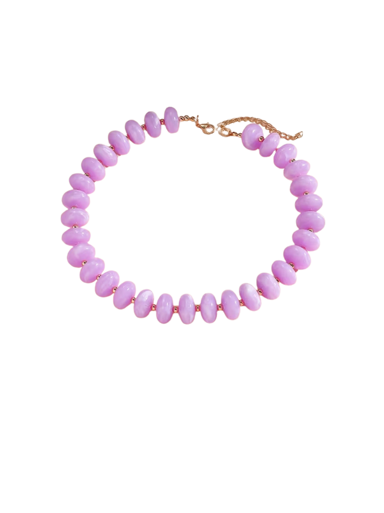 Gradient beaded necklace with smooth, light purple oval beads and a gold-tone clasp.