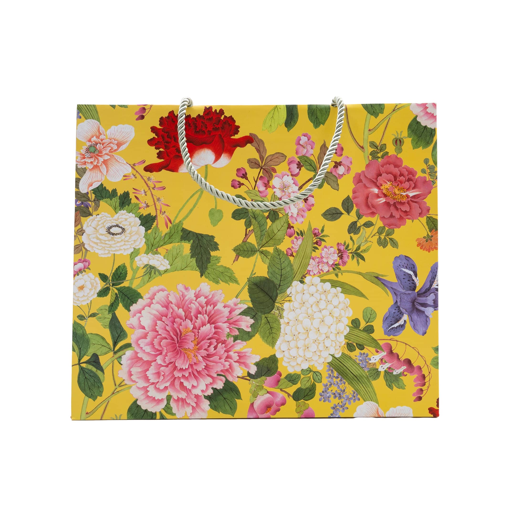 Large yellow gift bag featuring a vibrant floral pattern with pink, red, and white flowers.