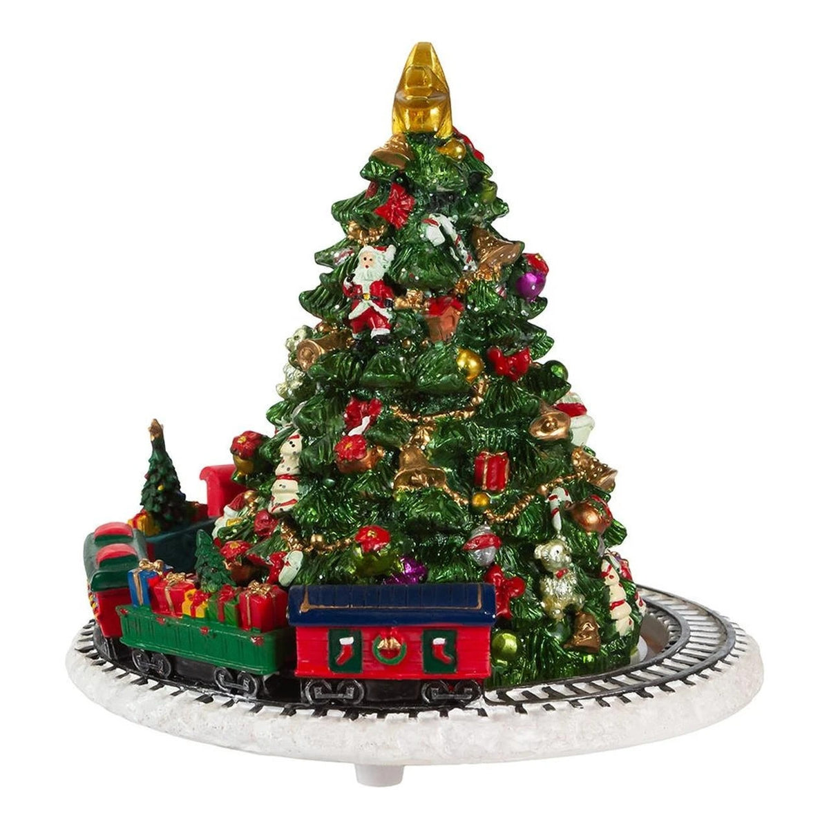 Christmas tree music box with a revolving toy train on a circular track and a gold star topper.