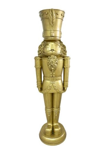 Antique gold polyresin nutcracker with LED lighting inside a decorative frame