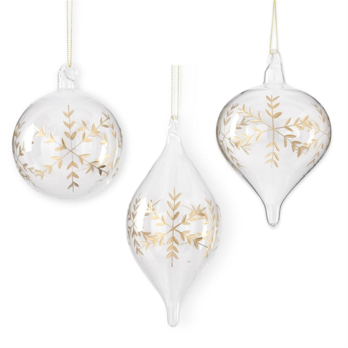 Set of three clear glass ornaments in round and teardrop shapes with gold etched snowflakes.