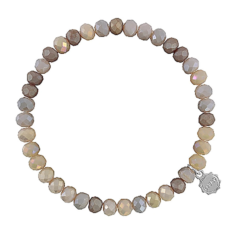 Lizas Quadro Big crystal stretch bracelet with faceted neutral-toned beads and a silver charm.