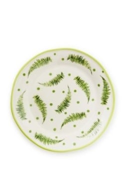 Handmade steware fern forest salad plate with green leaf pattern on natural background