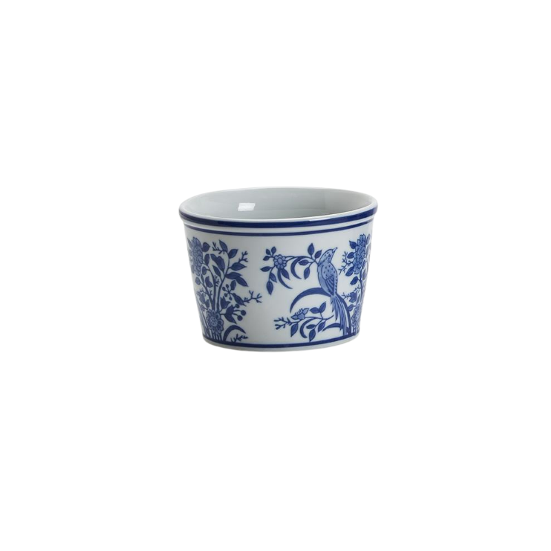 White ceramic deli container with blue chinoiserie bird and floral pattern.