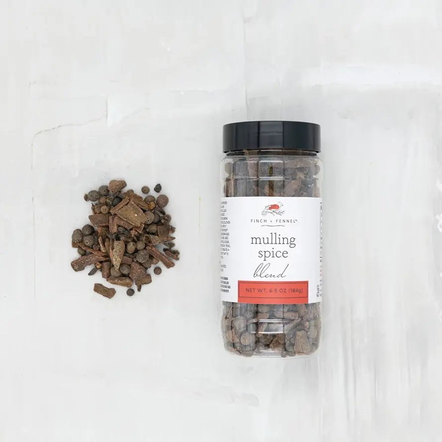 A jar of Mulling Spice Blend with a red lid.
