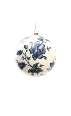 Round white glass Christmas ornament featuring a blue floral rose pattern with stems and leaves.