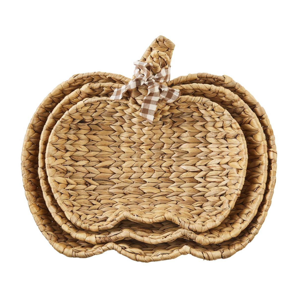 Woven pumpkin-shaped bowl made from water hyacinth with a natural brown texture.