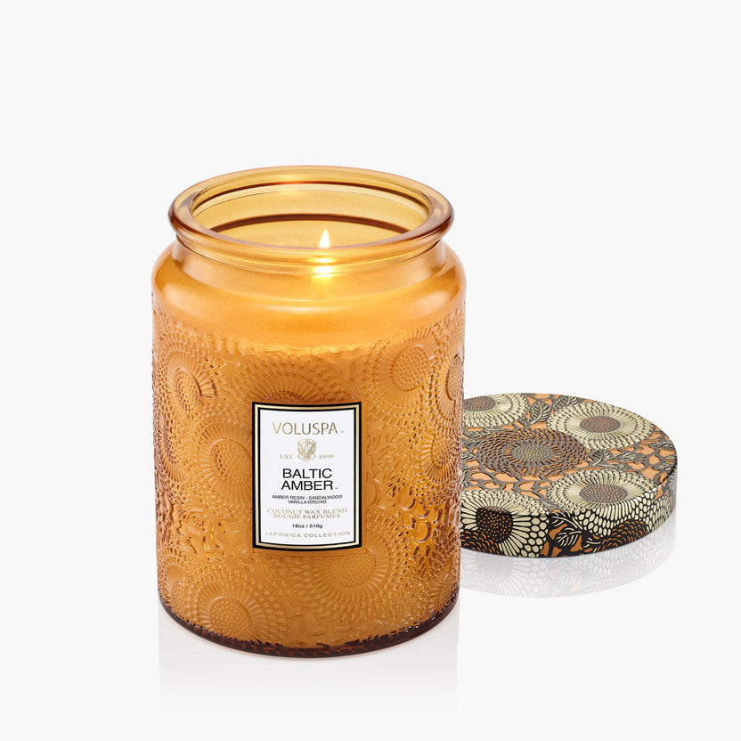 Large jar candle with natural wick in a neutral container