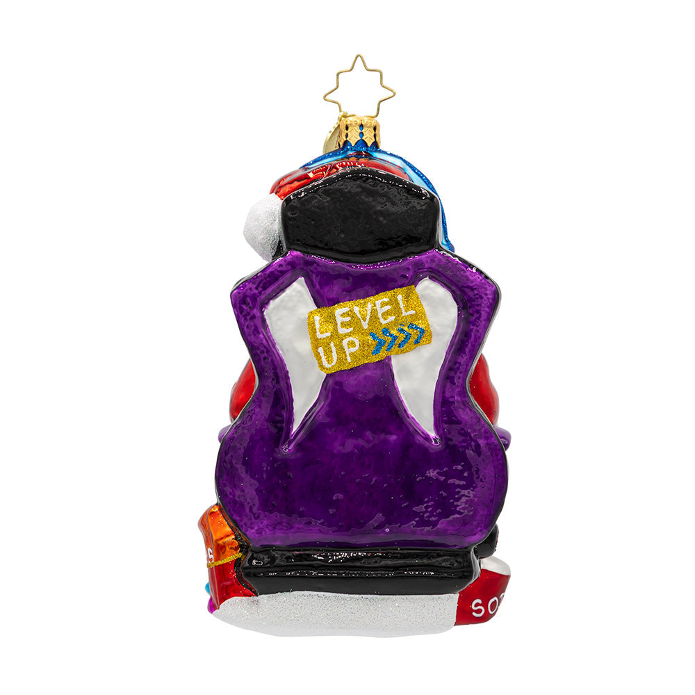 Back view of Game Master Santa glass ornament in a purple gaming chair with 'LEVEL UP' text.
