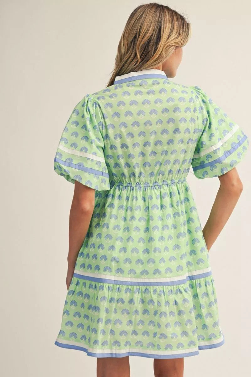 Boho floral print cotton dress with puff sleeves, tiered skirt, standing neckline, and side pockets.
