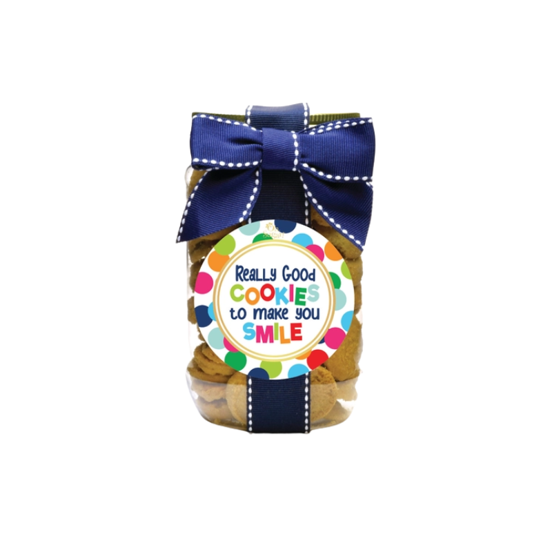 Pint-sized cookie jar with a blue ribbon and a colorful polka dot 'Really Good Cookies' label.