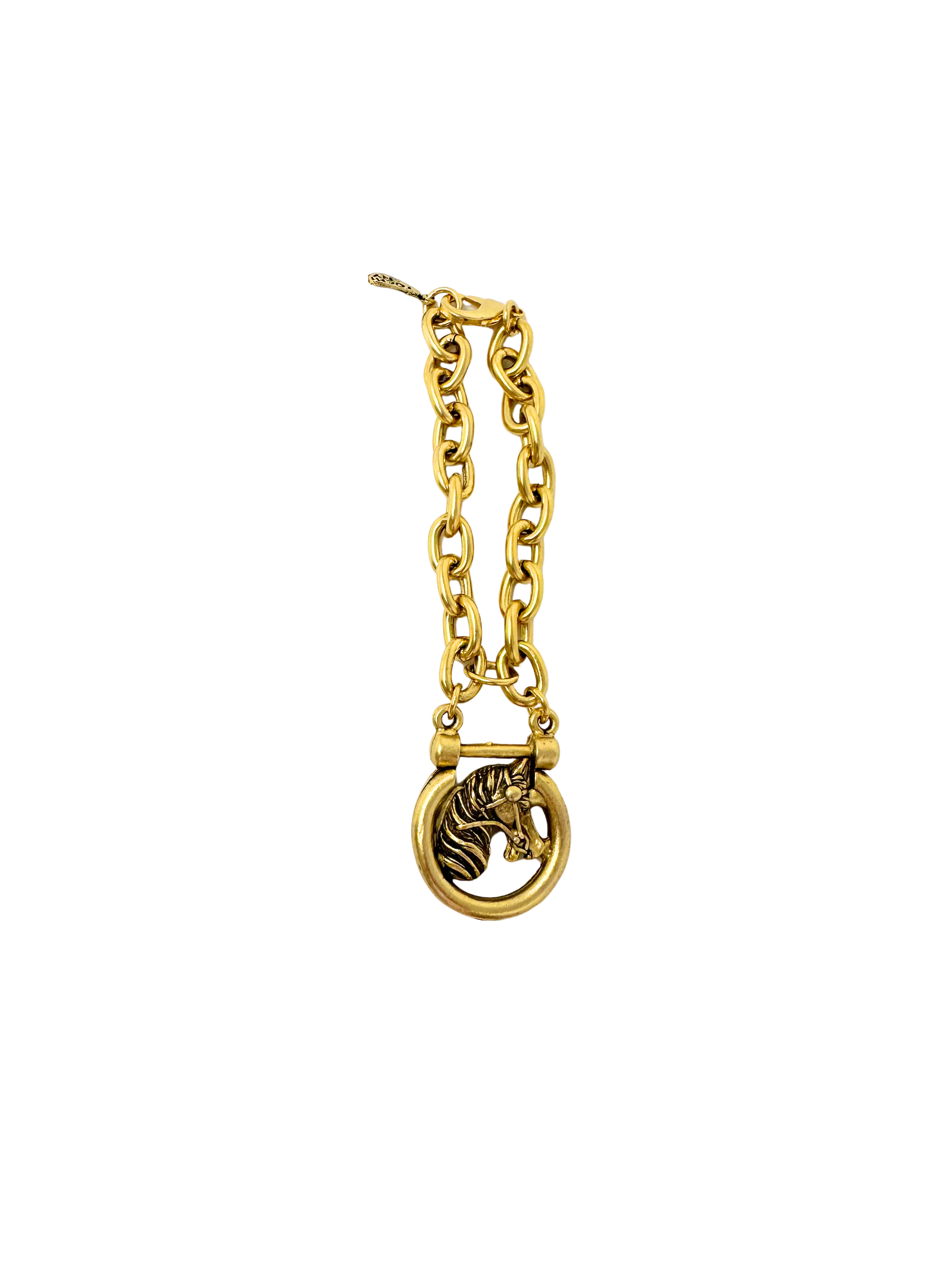 Gold-tone Apache Horse Bracelet featuring a chunky chain and a circular horse head charm.