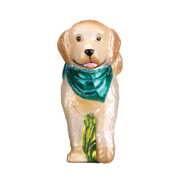 Doodle Dog glass ornament with a golden coat and a green glittery bandana.