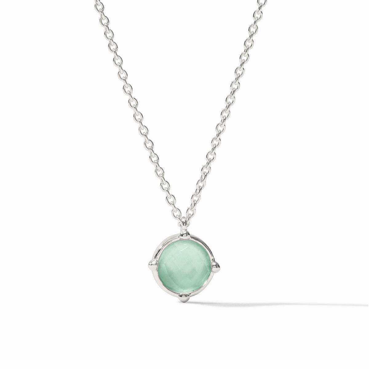 Honeybee Solitaire Necklace in silver with a round, faceted light green gemstone pendant.
