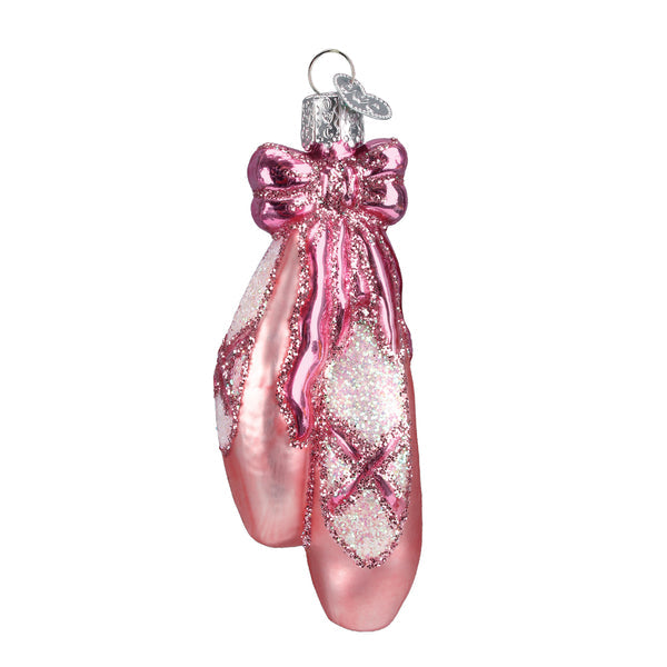 Miniature ballet shoe ornament in pink satin with gold toe cap.