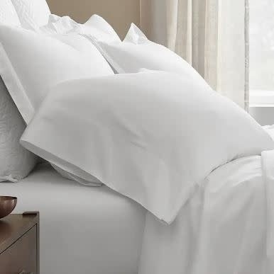 White organic cotton king pillowcase set with signature hemmed edges.