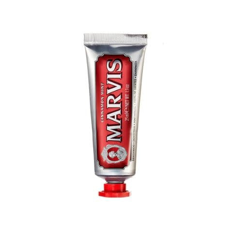 Front view of Marvis Cinnamon Mint toothpaste in a white tube with red and green label details.