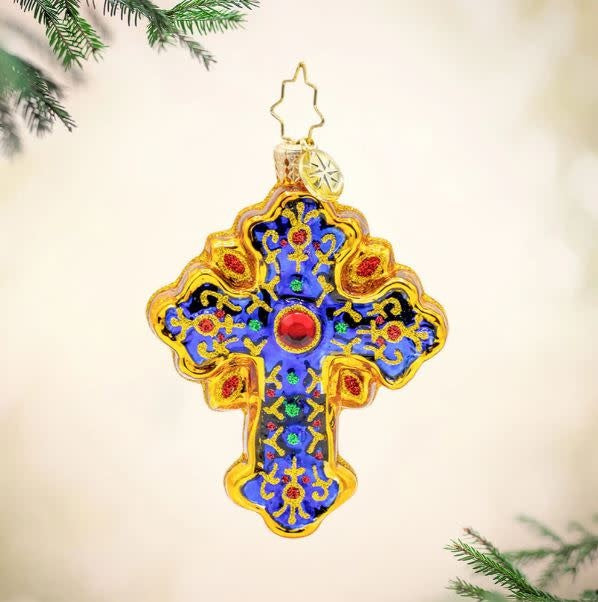 Sacred Season Cross Gem pendant featuring an intricate gemstone cross design on a chain.