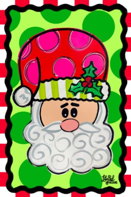 Wood door hanger featuring a Santa Claus silhouette against a green background with white polka dots.