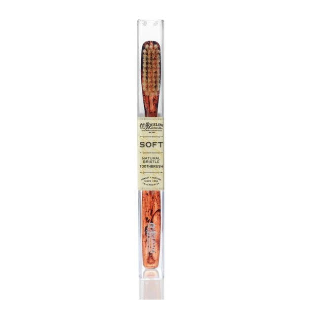 Natural boar bristle toothbrush with medium density in a tortoise shell pattern handle.