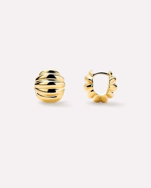Mini statement earrings in textured 14k gold plating with a polished finish on brass hoops.