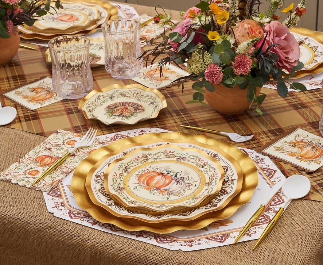8-inch round disposable paper salad plate with wavy edge, gold foil trim, and central pumpkin illustration.