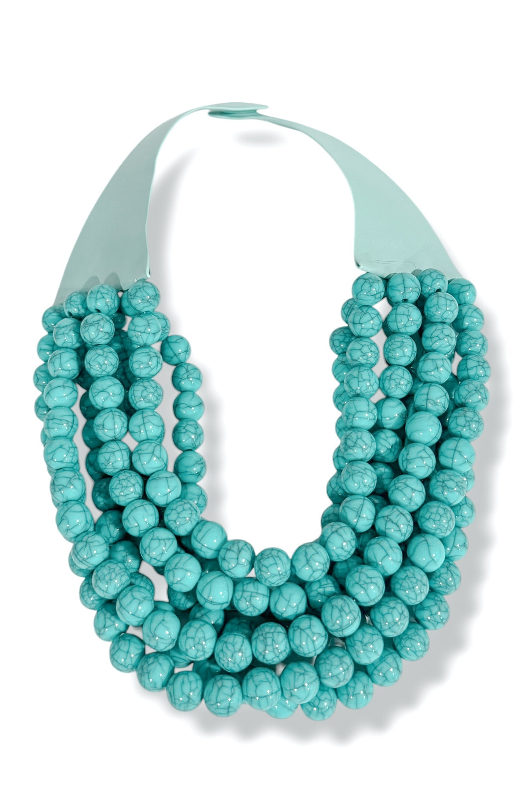 Multi-strand turquoise bead necklace with a light blue fabric band and magnetic clasp.