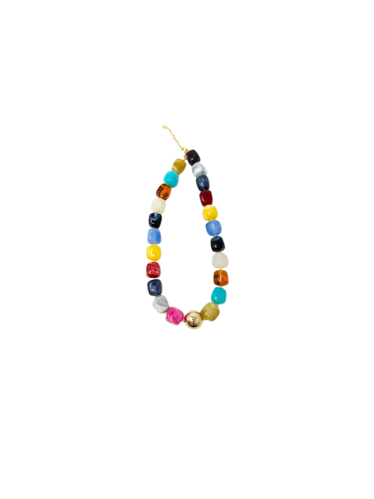 Multi-color beaded necklace with chunky, polished jewel-tone beads and a gold spherical accent.