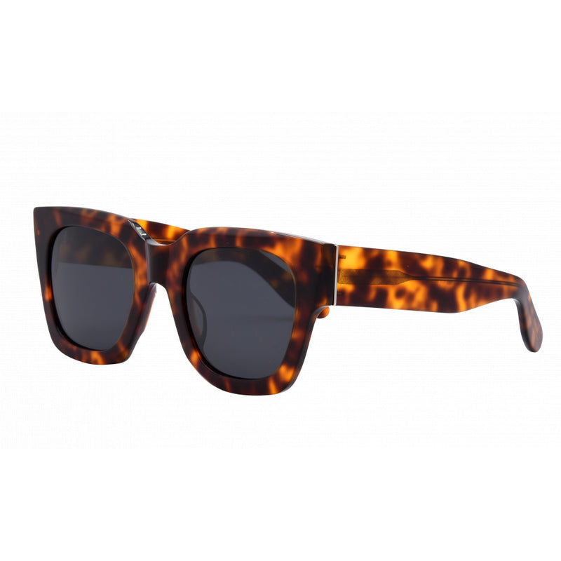 Jolene sunglasses in tortoise shell frames with dark smoke polarized lenses.