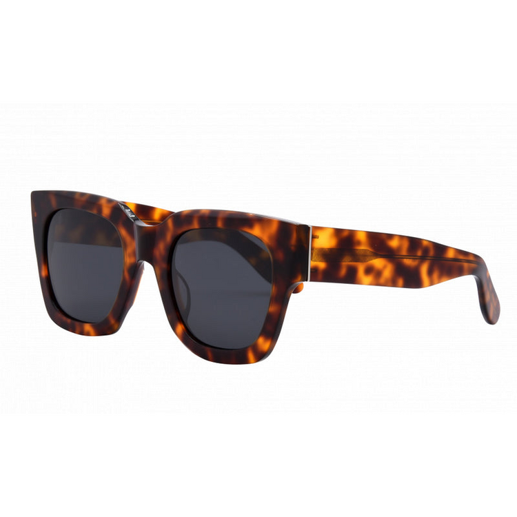 Jolene sunglasses in tortoise shell frames with dark smoke polarized lenses.