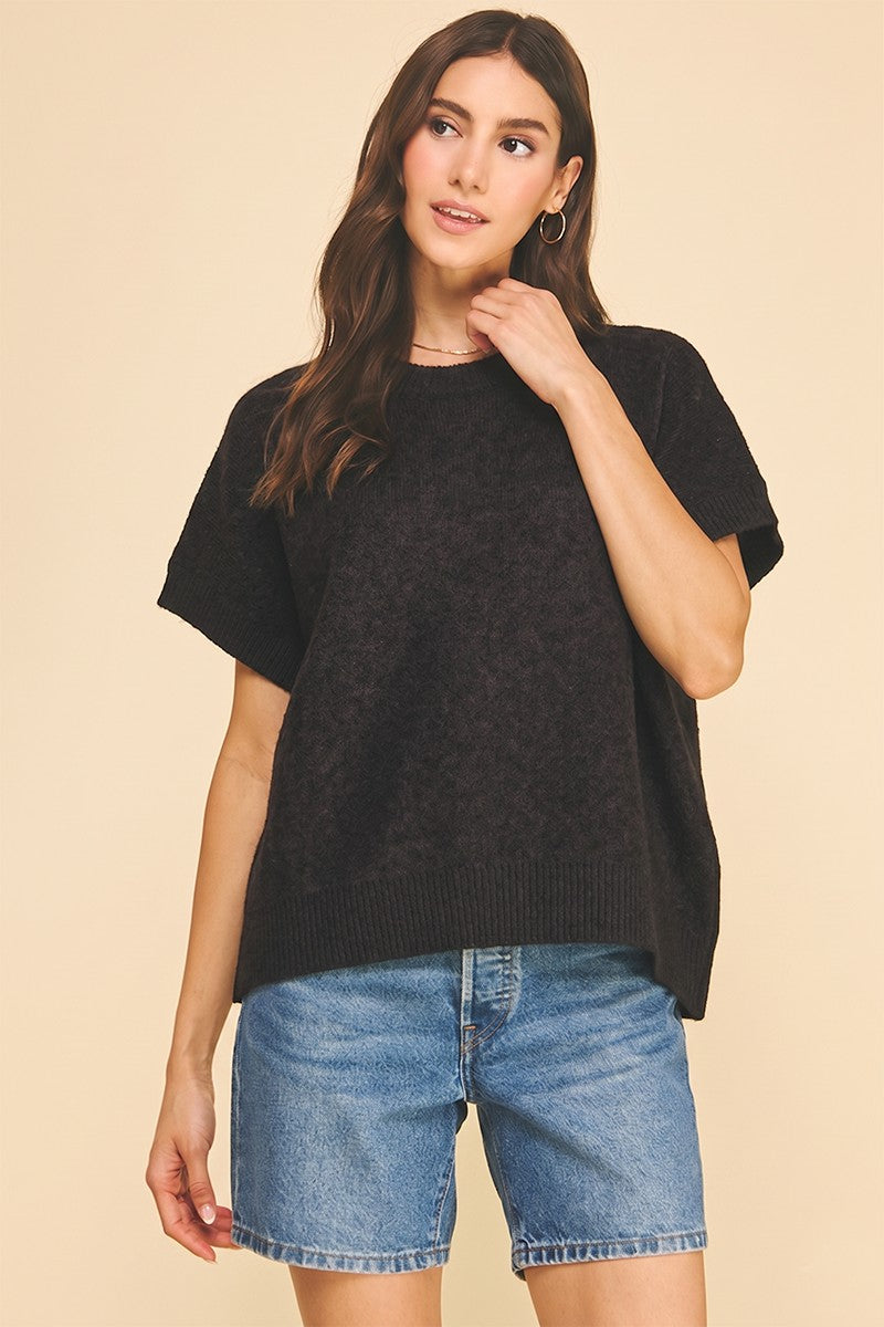 Bailey solid knit sweater in beige with cap sleeves and a relaxed fit.
