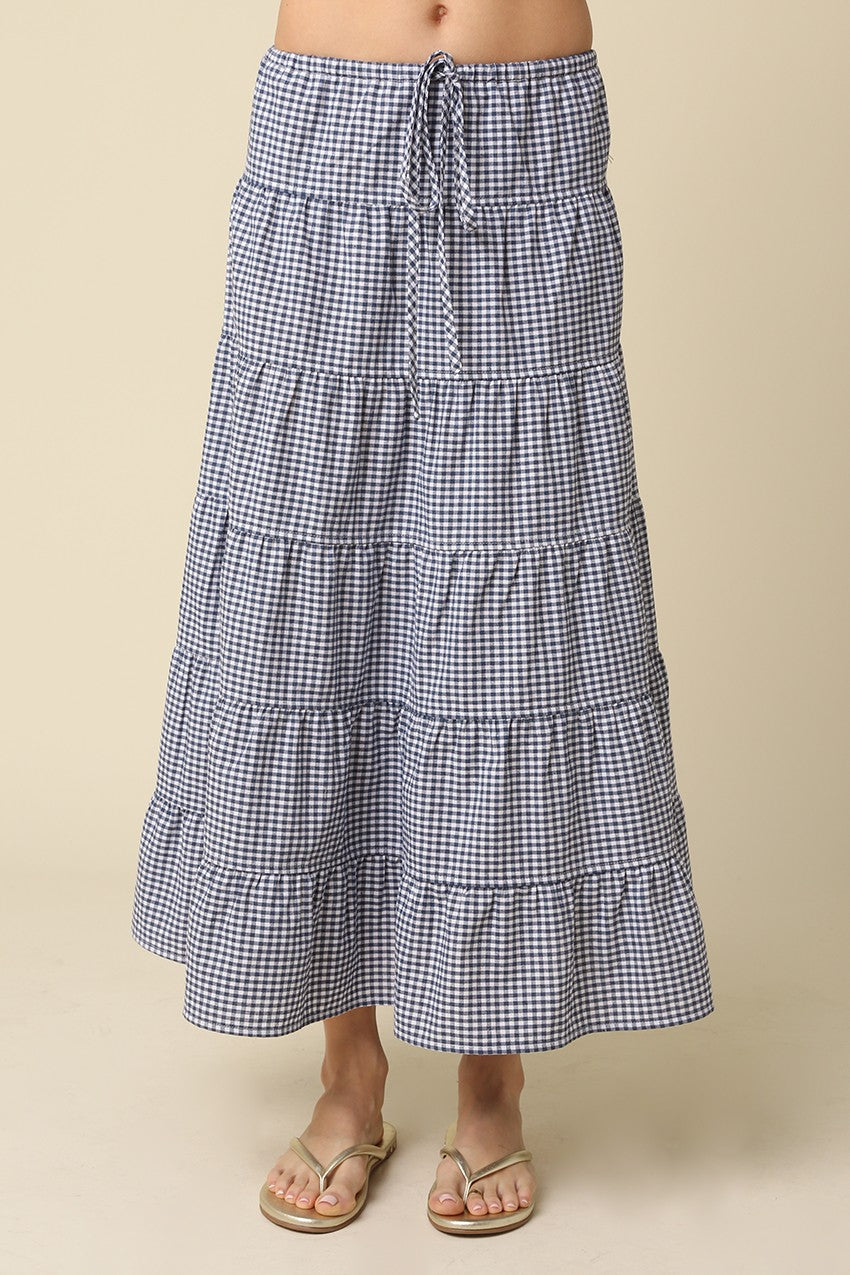 Jasmine Gingham Drawstring Tiered Maxi Skirt in navy and white linen blend fabric.