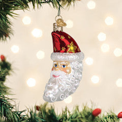 Santa Moon face ornament with a glowing moon motif on a dark background.