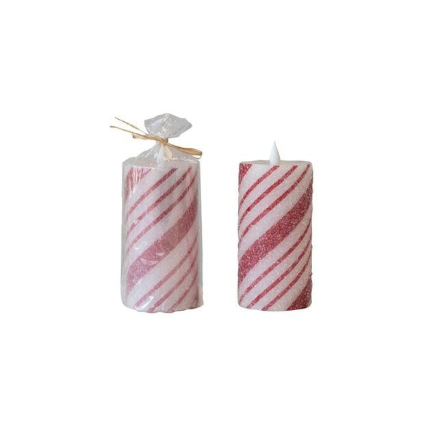 Flameless LED pillar candle with red and white candy cane stripes