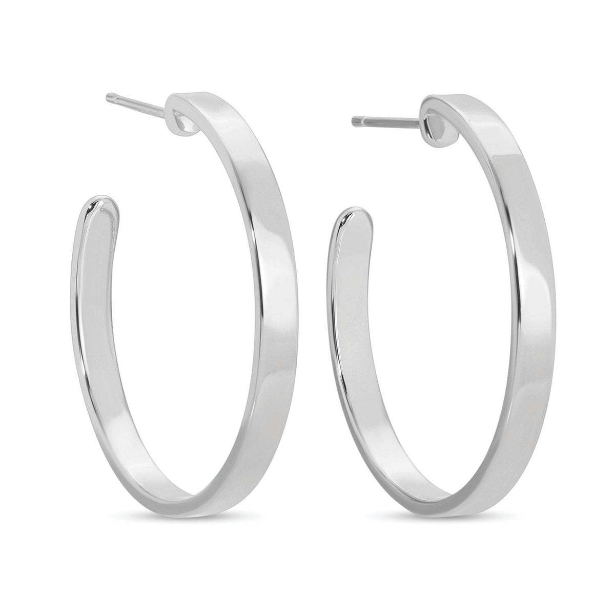 Polished brass flat hoop earrings with a minimalist circular silhouette.