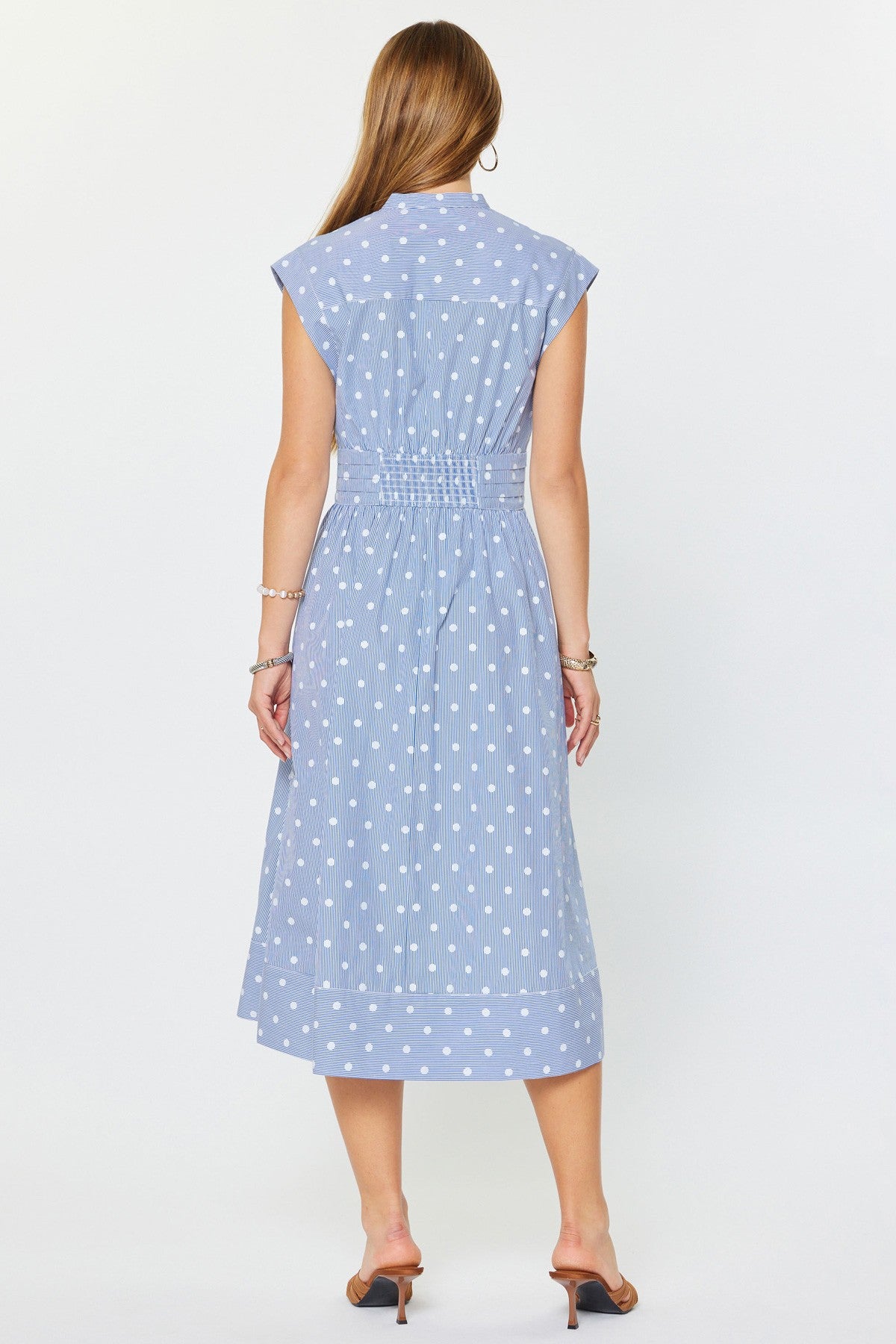 Audrey striped polka dot midi dress with V-neck, cap sleeves, tie waist bow, and smocked back in cotton-tencel fabric.