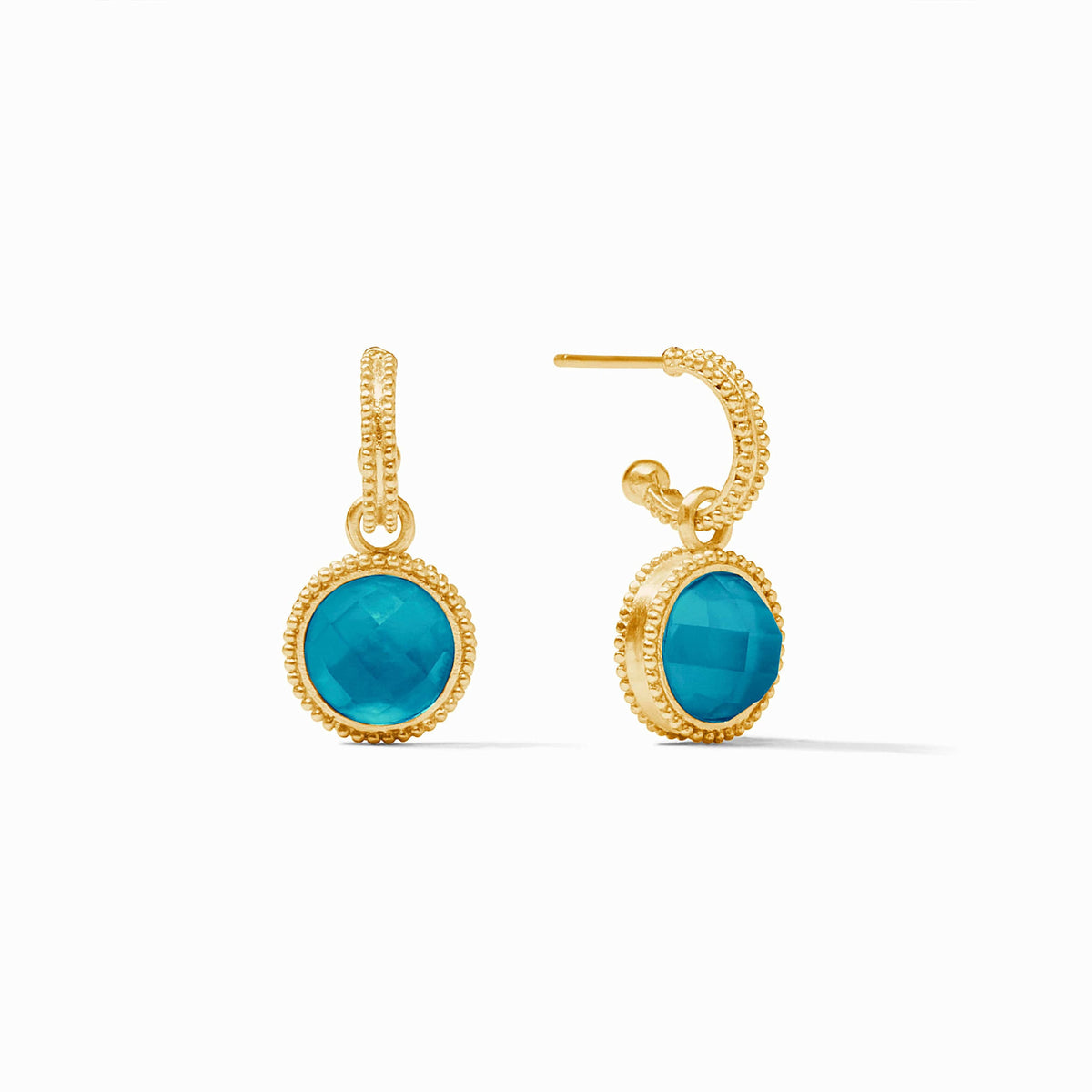Iridescent gold hoop earring with a mother-of-pearl fleur-de-lis charm and glass accents.