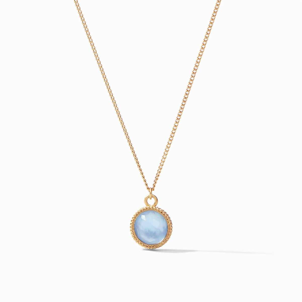 Adjustable necklace with a solitaire cubic zirconia on one side and a fleur-de-lis intaglio reverse.
