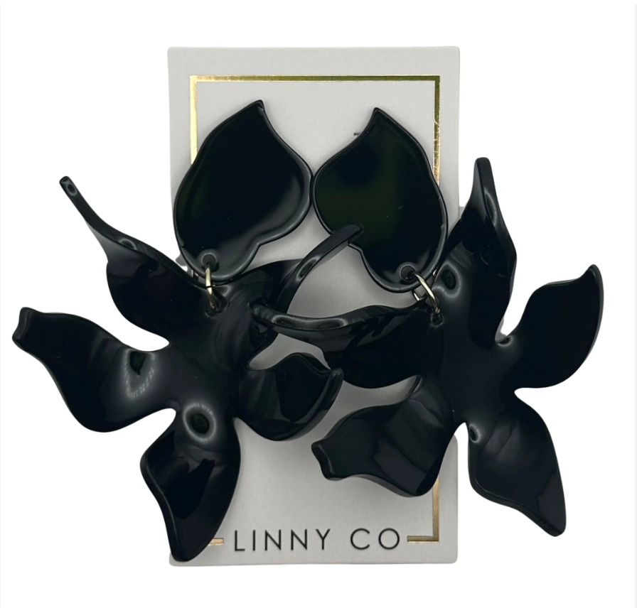 Black abstract floral stud earrings with a delicate feather-light silhouette.
