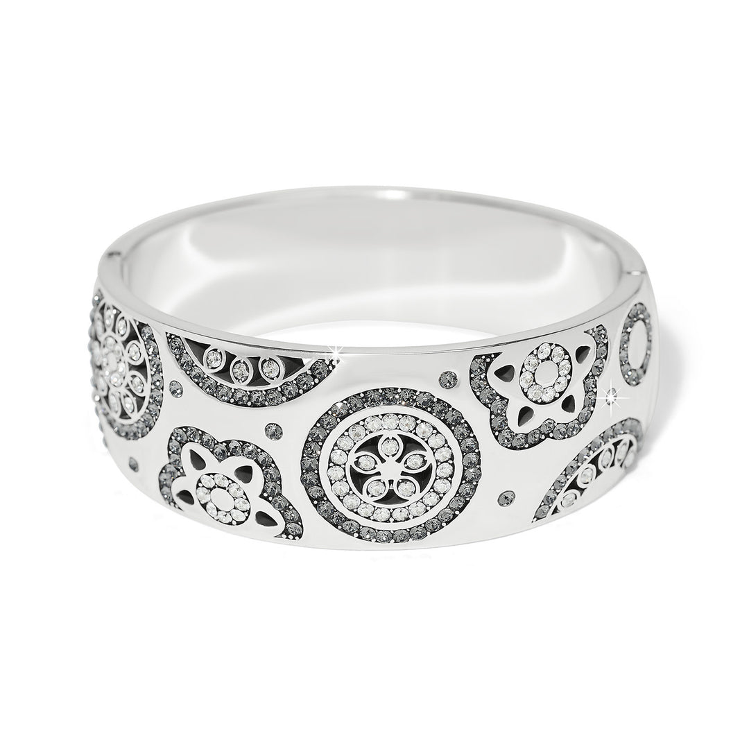 Silver plated wide hinged bangle bracelet featuring fine quality crystals.