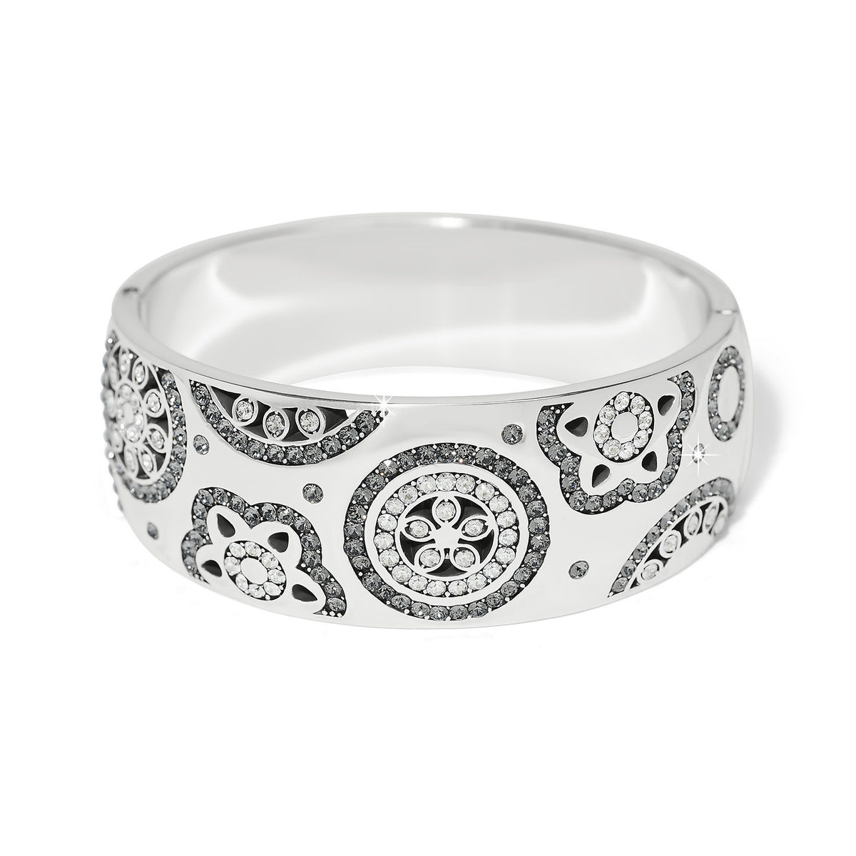 Silver plated wide hinged bangle bracelet featuring fine quality crystals.