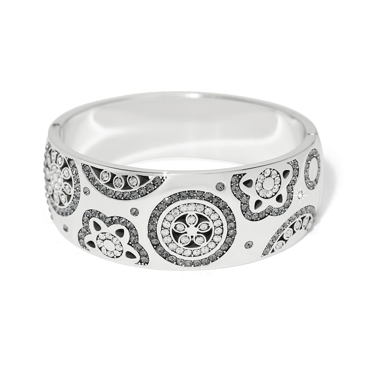 Silver plated wide hinged bangle bracelet featuring fine quality crystals.