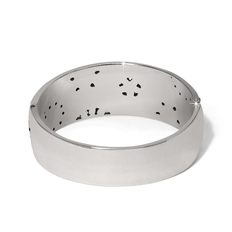 Silver plated wide hinged bangle bracelet featuring fine quality crystals with a bold feminine silhouette.