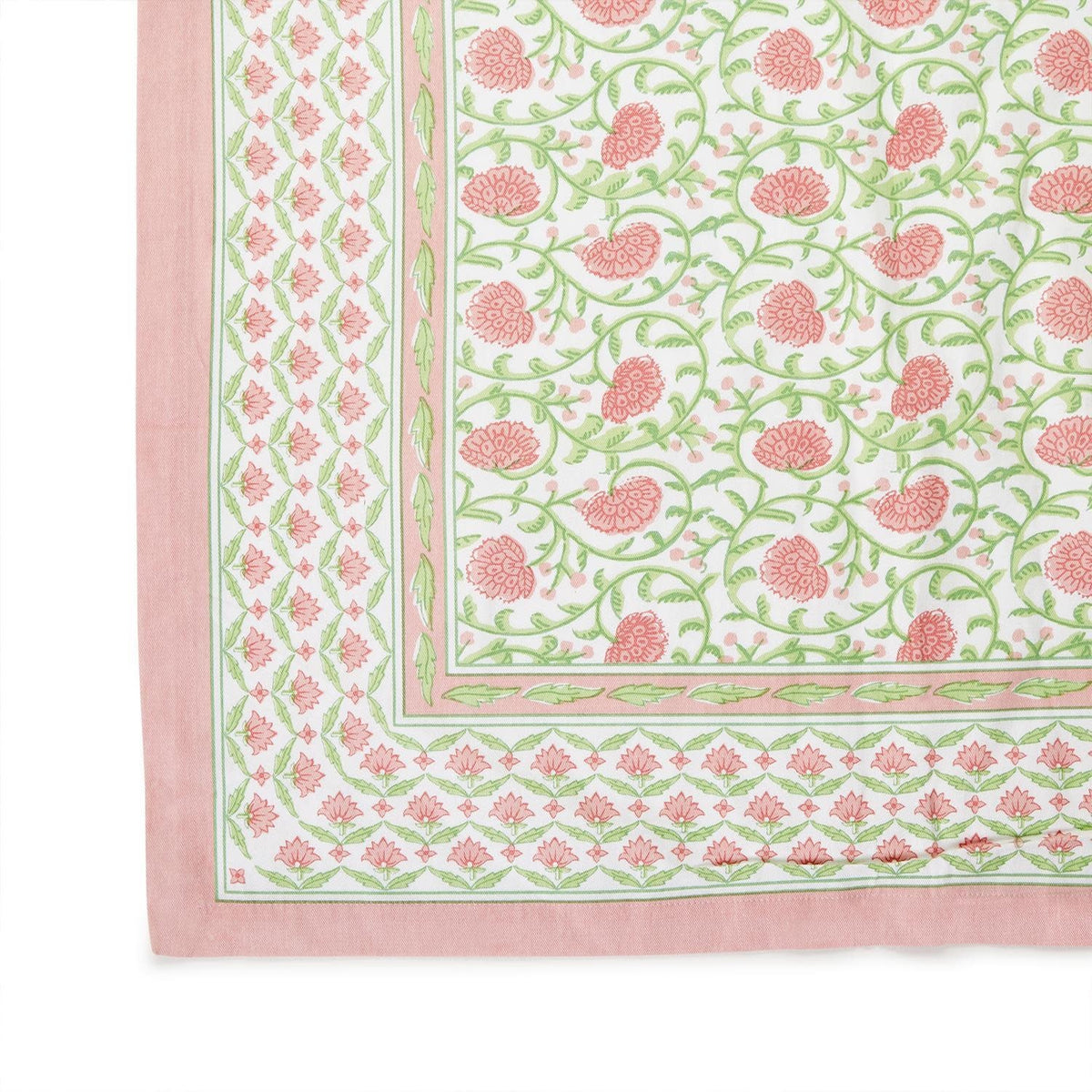 Floral block print tablecloth made from white cotton with a colorful floral pattern.