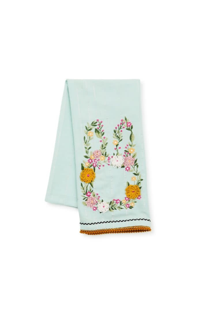 Floral bunny embroidered cotton dish towel with a white background.